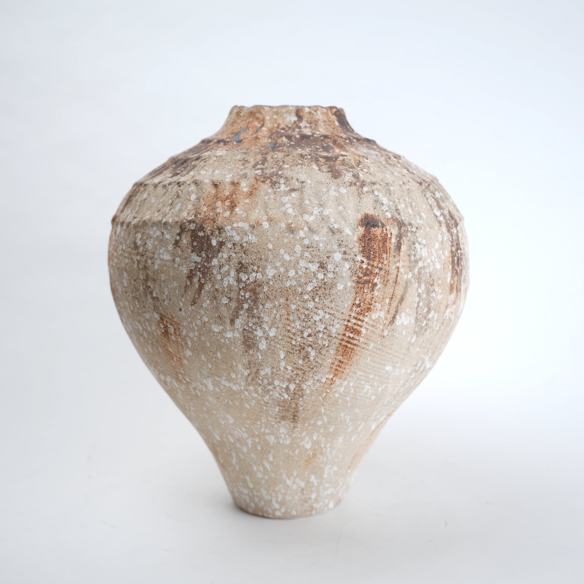 Rust patina ceramic vase with textured earthy finish available in small and large sizes for home decor
