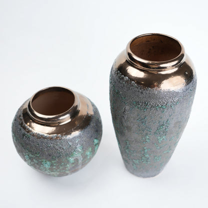 green charcoal ceramic vase with patina texture and bronze neck