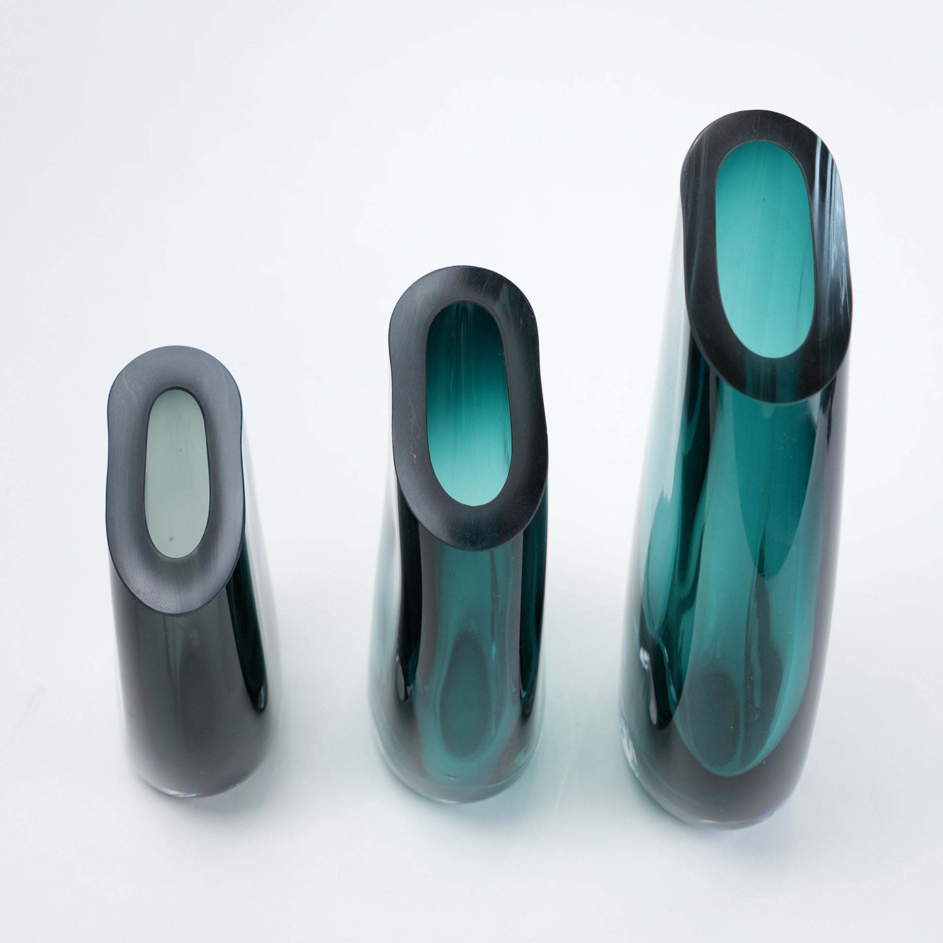 Emerald Curve vases top-down oval mouths