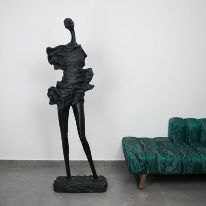 modern abstract sculpture elongated human figure decor