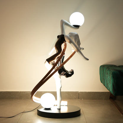 Modern floor lamp with artistic design on a neutral background