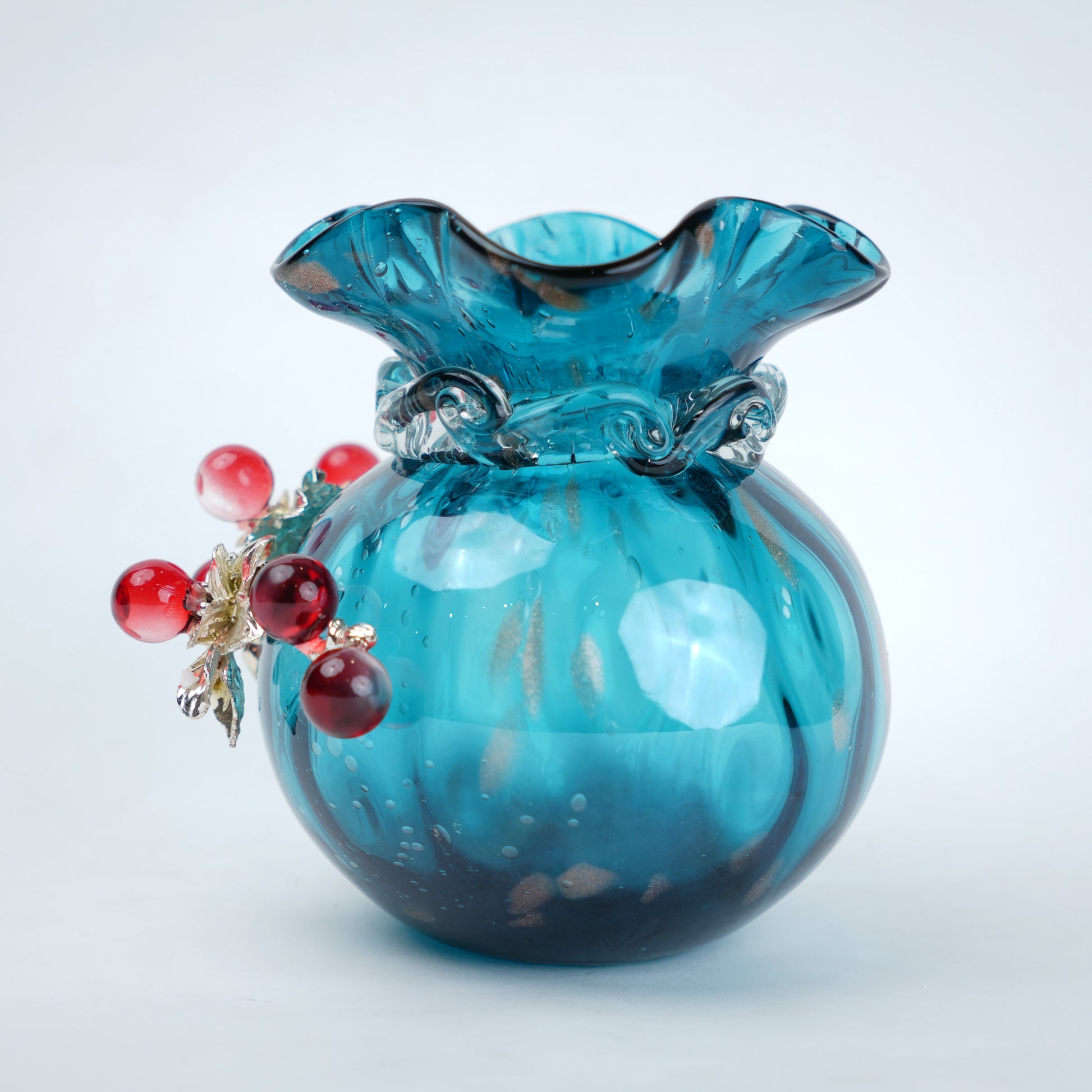 Aqua Bloom turquoise vase, red berry close-up