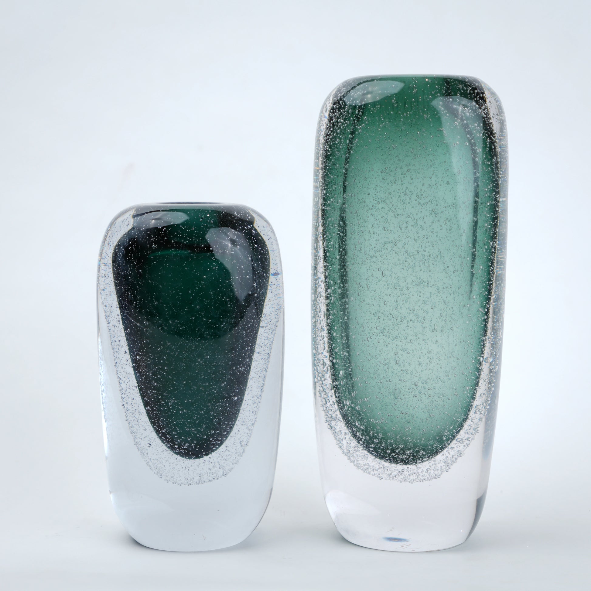 Green vase duo, teal cores, scale shot