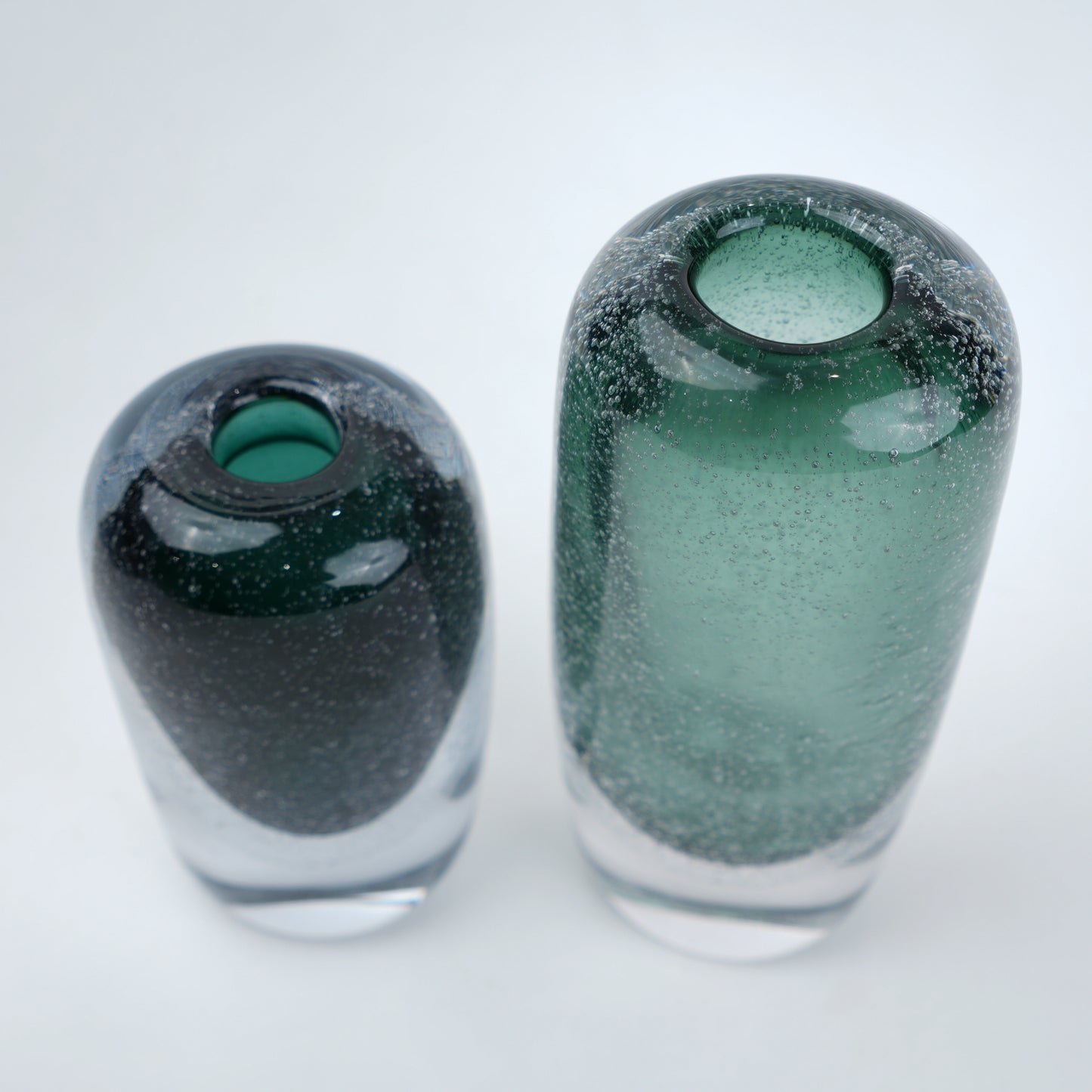 Green vase pair, mouth-up view, scale shot
