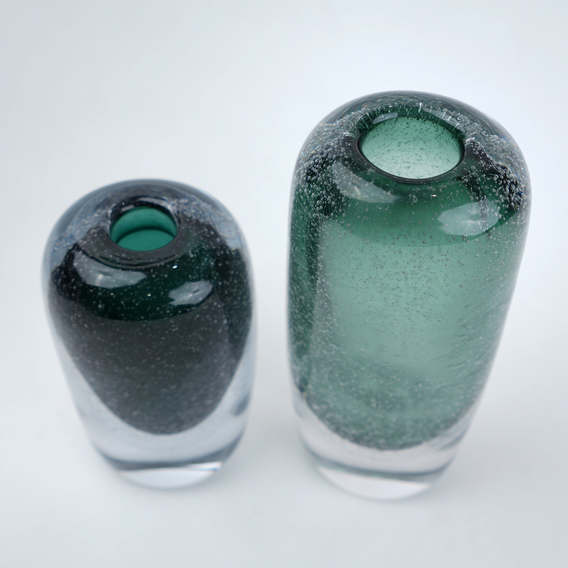 Green vase pair, mouth-up view, scale shot