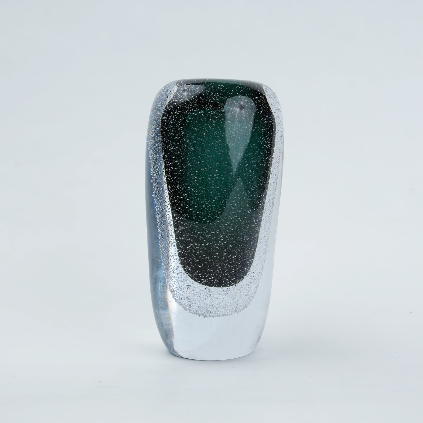 Green vase, elongated dark form, front white
