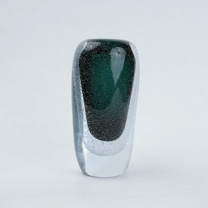 Green vase, elongated dark form, front white