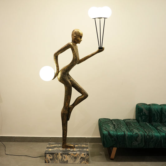 antique gold juggler sculptural floor lamp with orb lights