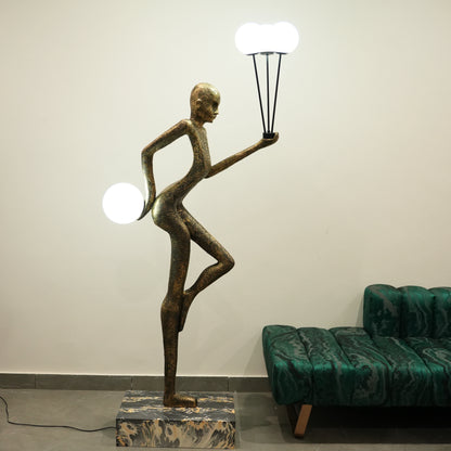 Juggler Sculptural Floor Lamp lifestyle styling with decor