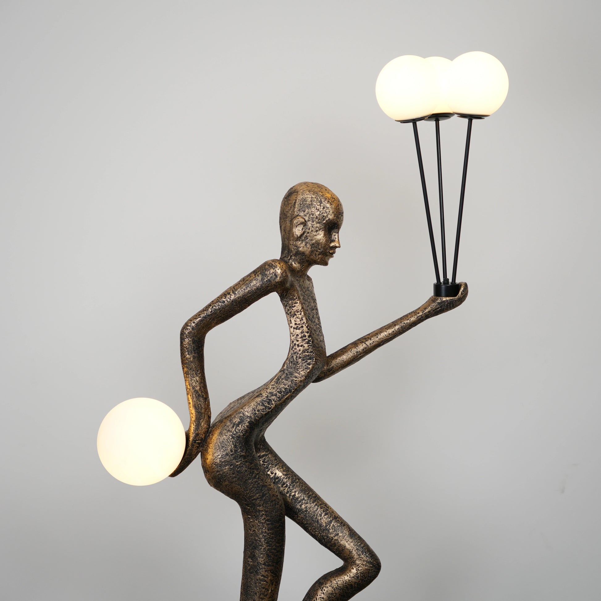 Juggler Sculptural Floor Lamp placed in modern interior