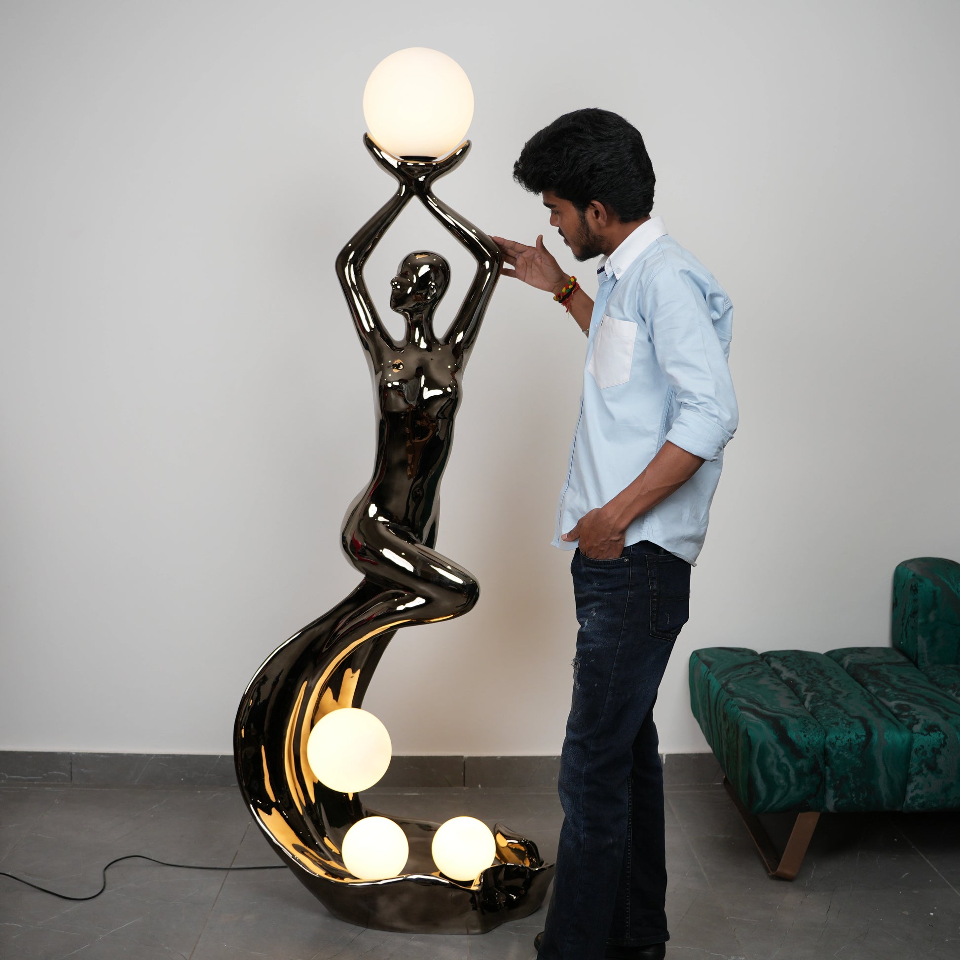 modern electroplated floor lamp with glowing spheres