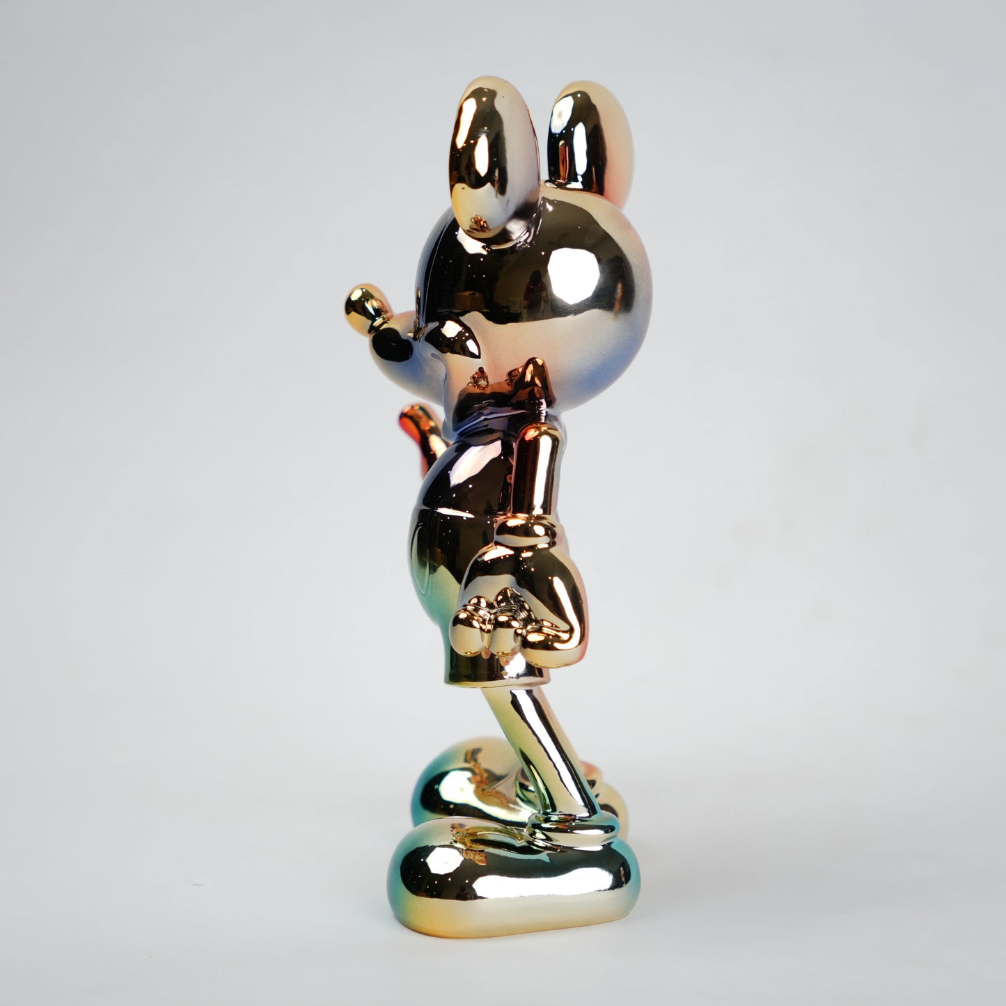 Rainbow Radiance Mouse Figurine in modern living room setup