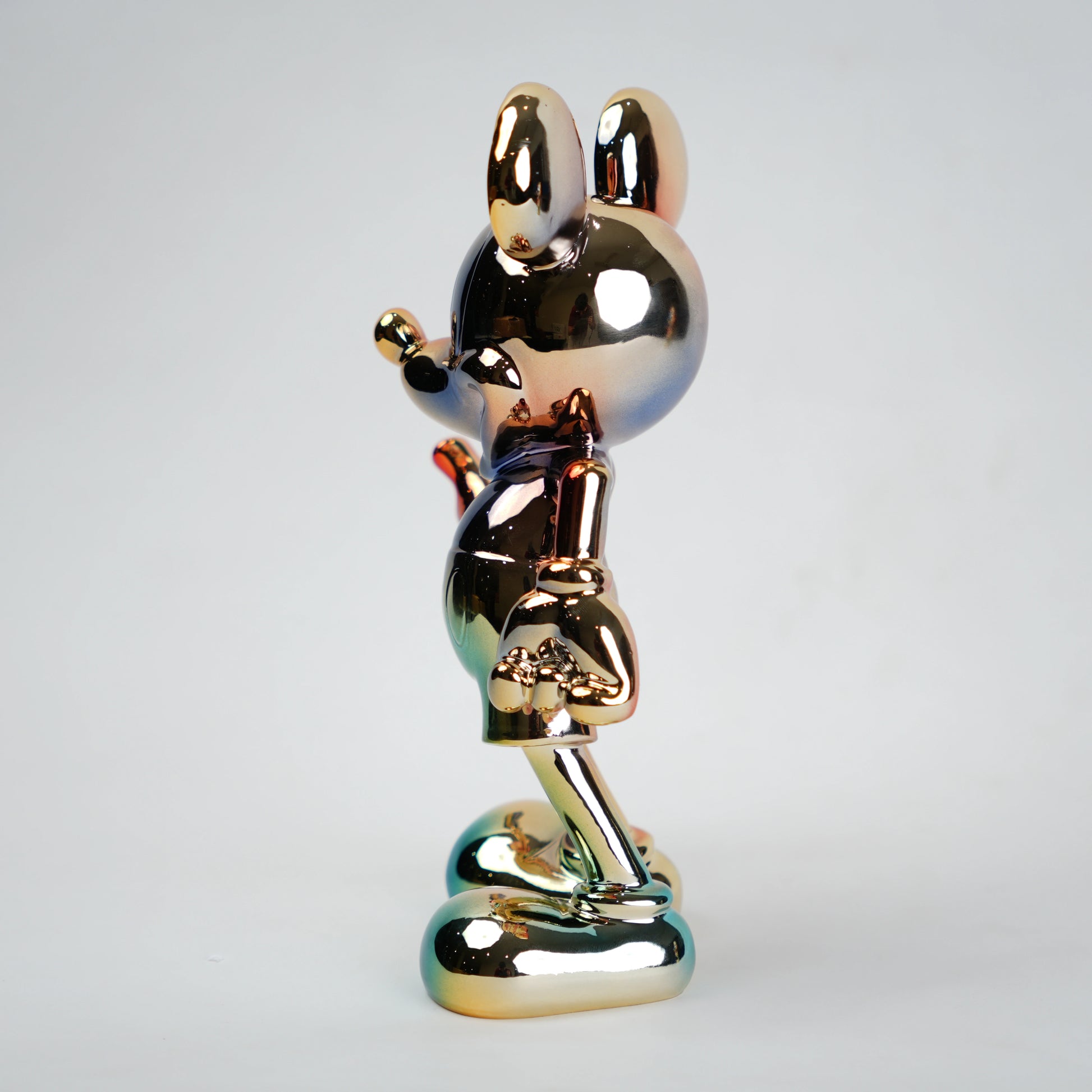 Rainbow Radiance Mouse Figurine in modern living room setup