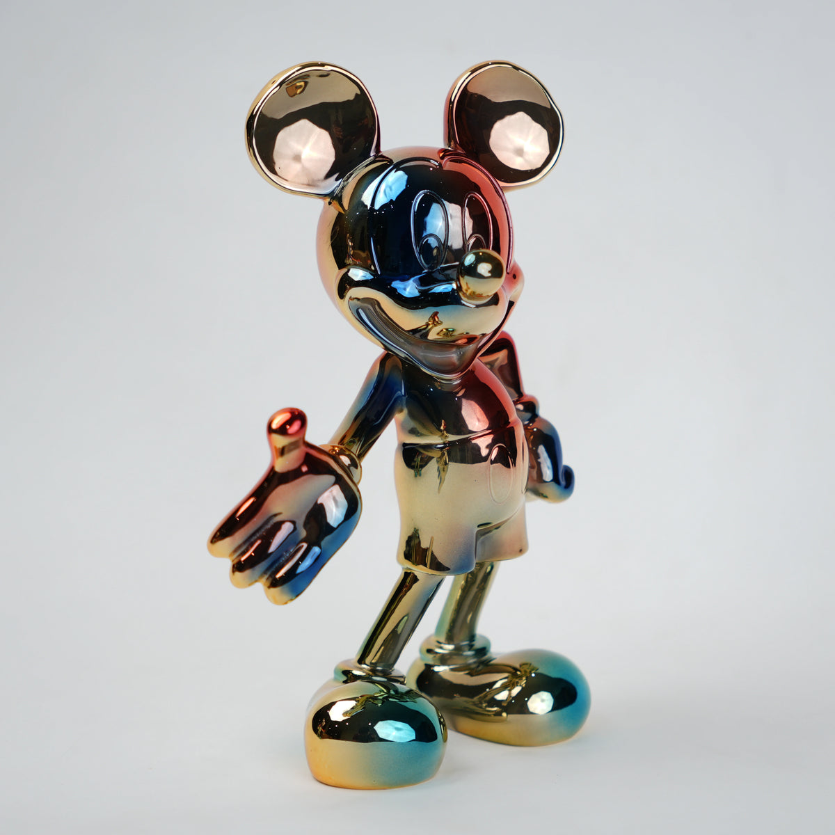 Rainbow Radiance Mouse Figurine styled on console table