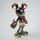 Rainbow Radiance Mouse Figurine styled on console table