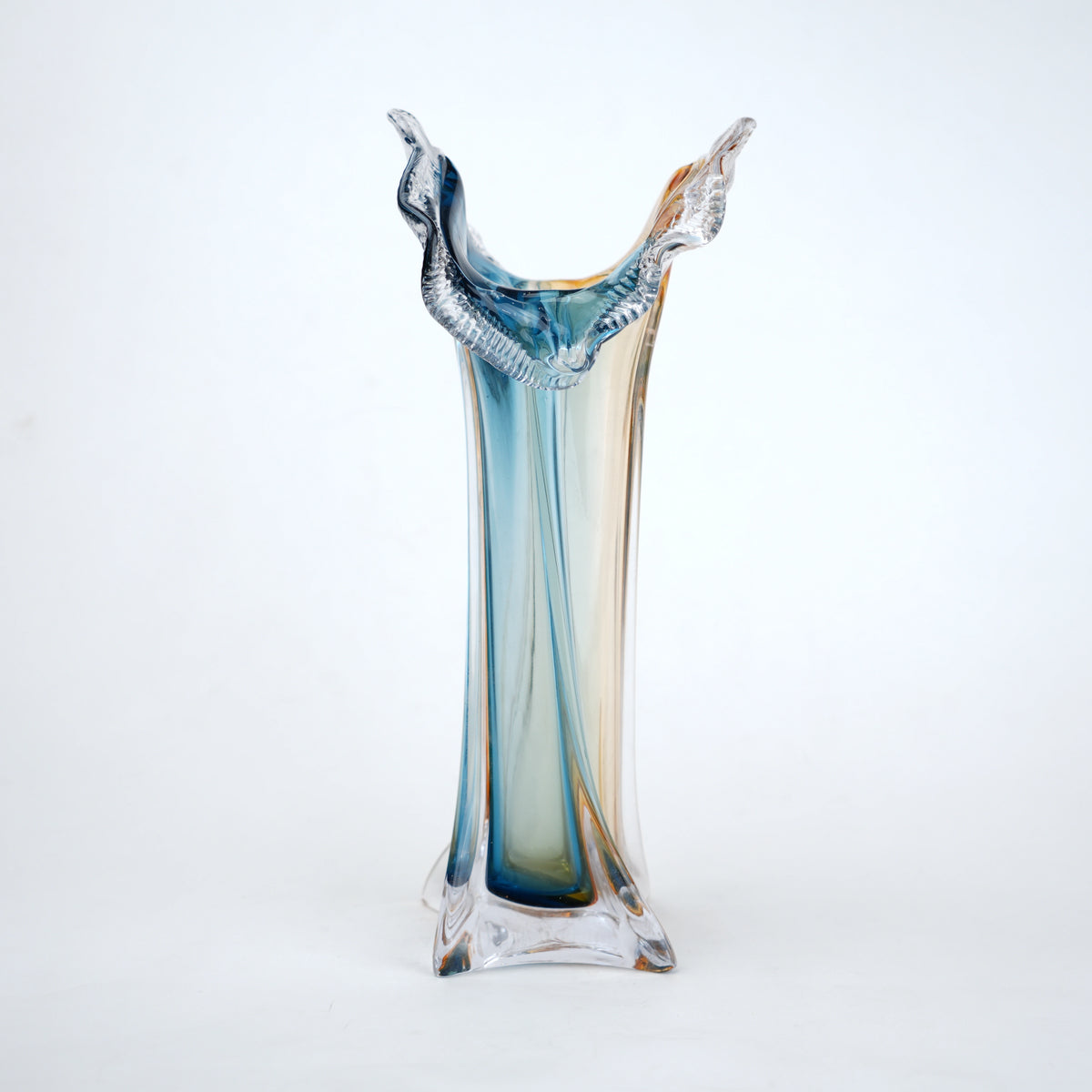 Dual tone blue and amber art glass vase with sculpted rim available in tall and small sizes