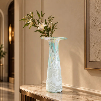 Tall frosted white glass vase with elongated tapered body and flared iridescent rim.