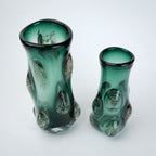 Emerald green glass decorative vase with glossy finish featuring raised textured bubble detailing and gradient color with flared opening