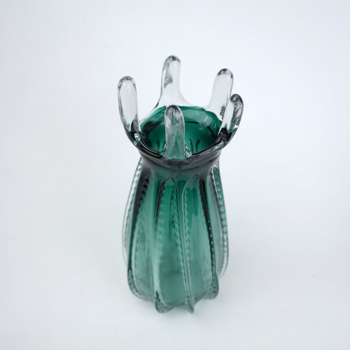 Emerald green glass vase with crown rim design available in small and big sizes for modern decor