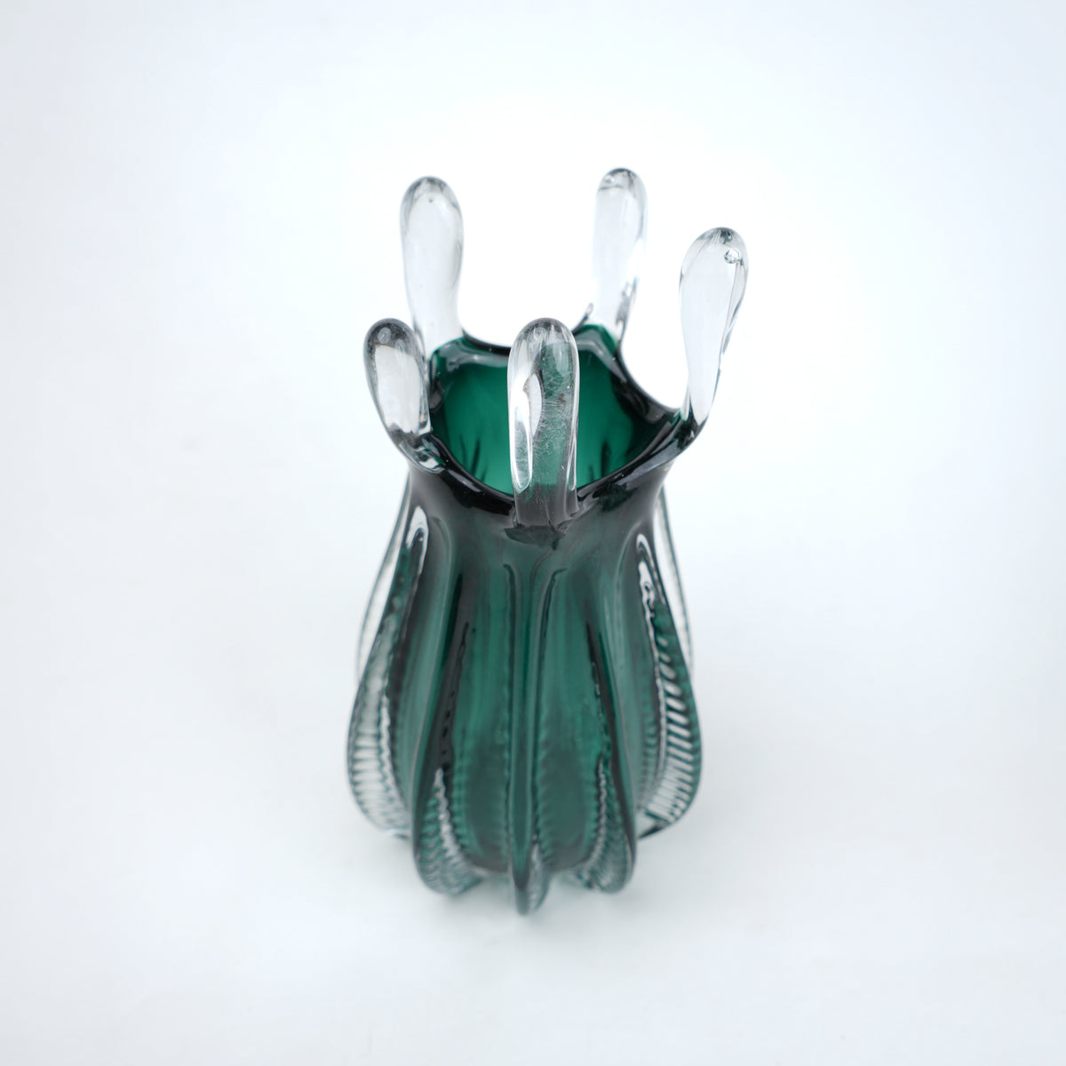 Emerald green glass vase with crown rim design available in small and big sizes for modern decor