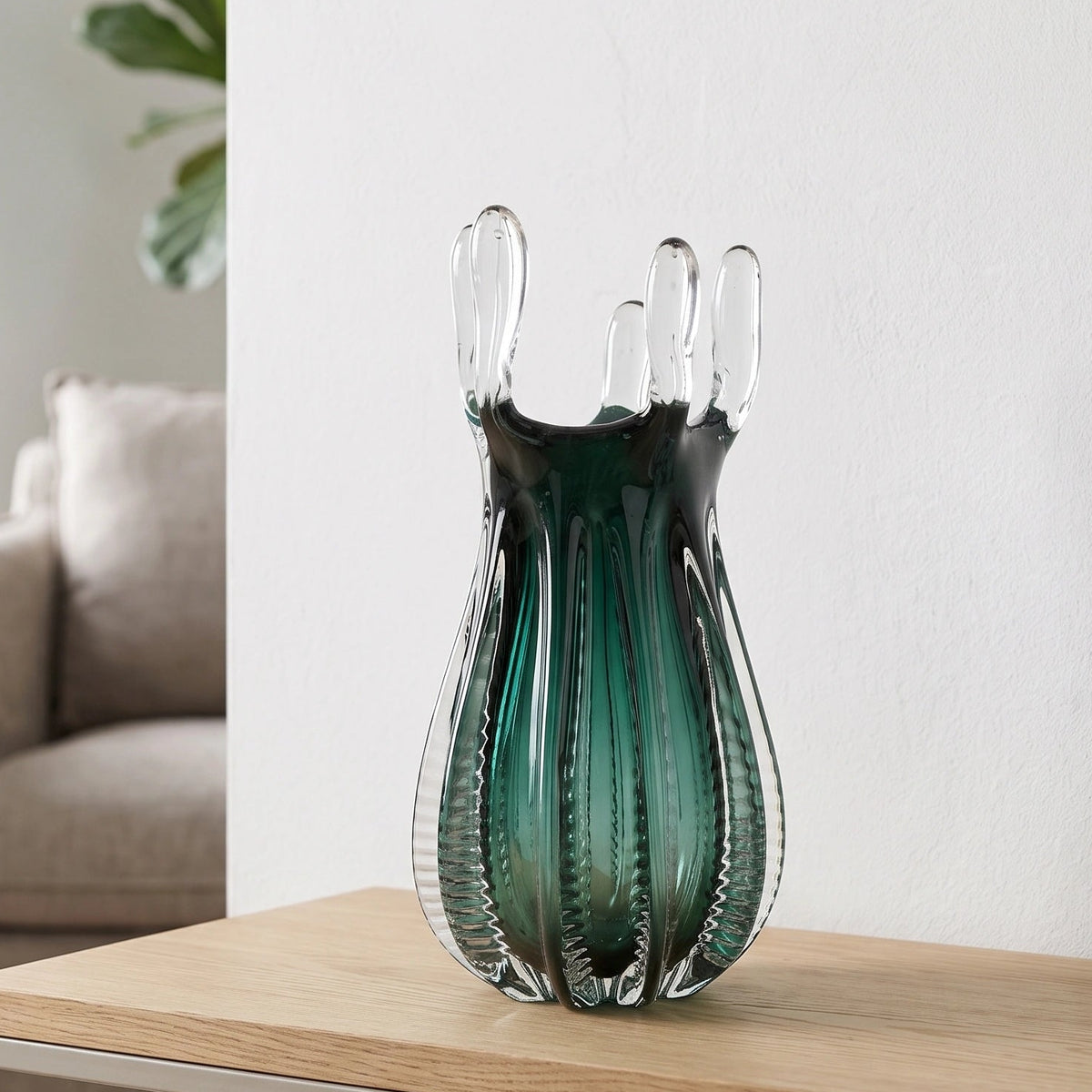 Emerald green glass vase with crown rim design available in small and big sizes for modern decor