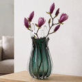 Emerald green glass vase with crown rim design available in small and big sizes for modern decor