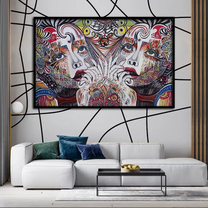 A vibrant, abstract face art painting displayed on a large canvas, hanging on a wall over a white sofa in a modern living room setting.