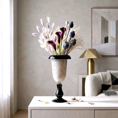 Speckle glass vase w/ calla lilies on console