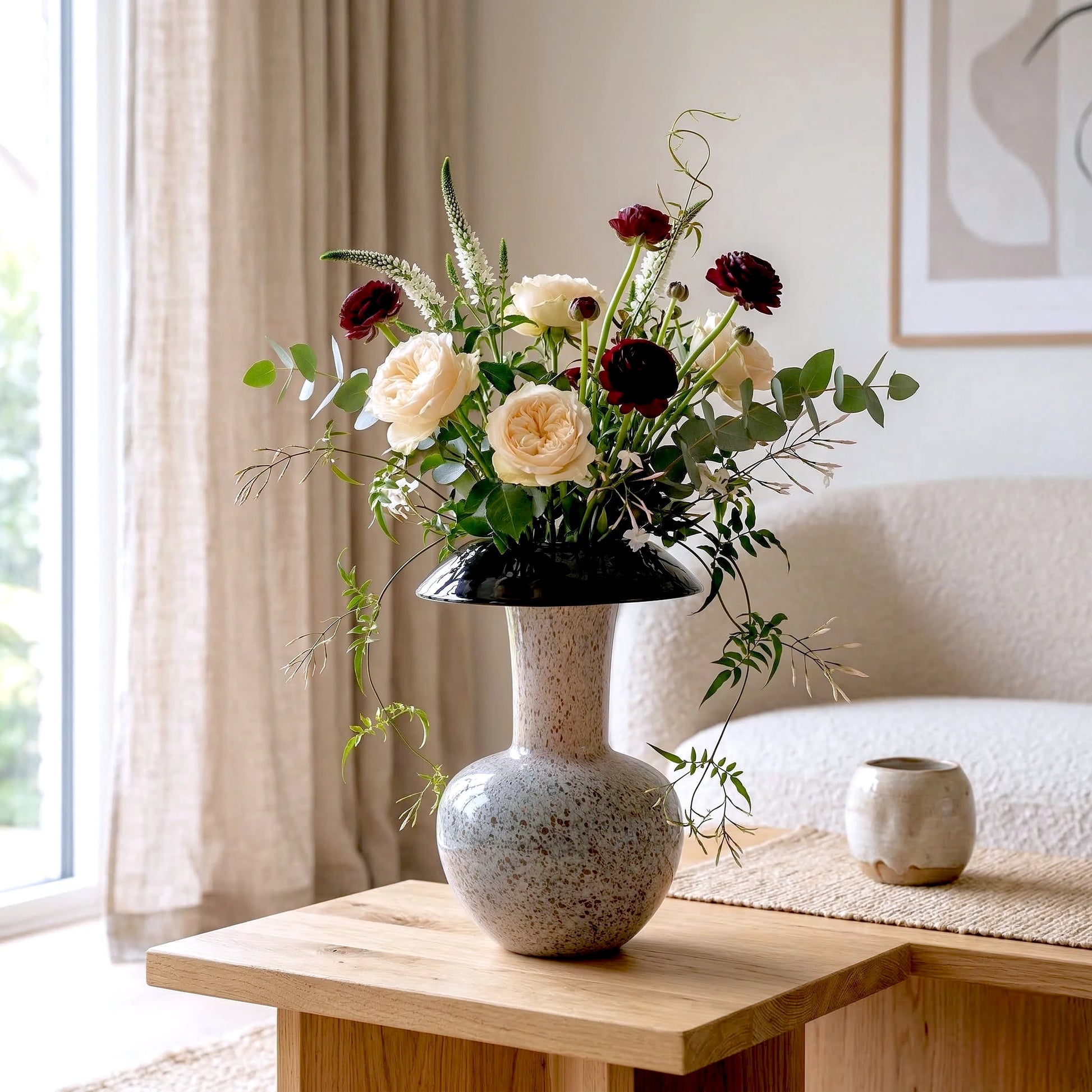 Small flared rim urn w/ cream roses, oak