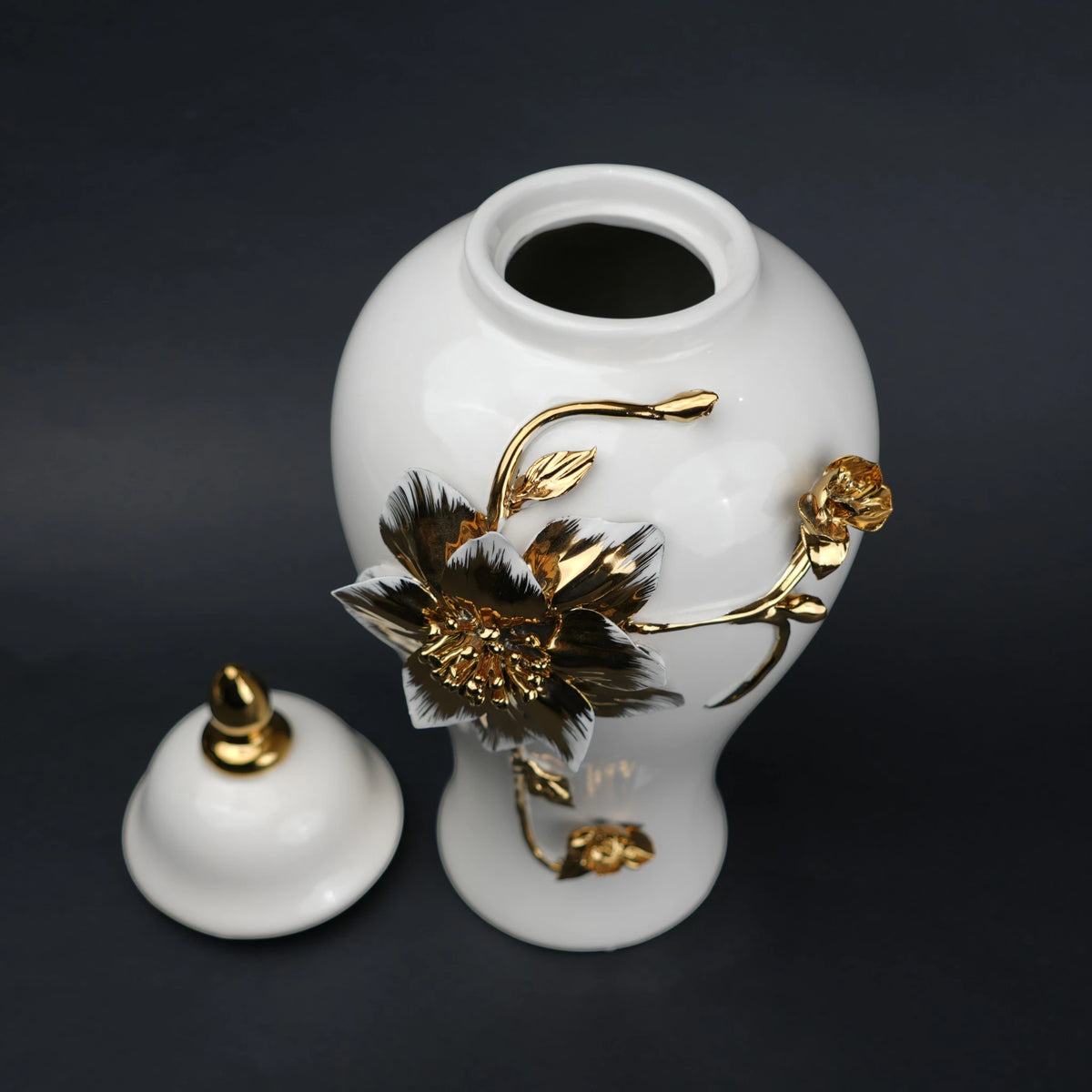 White ceramic jar with gold floral stem design, lid and vase use for home decor styling