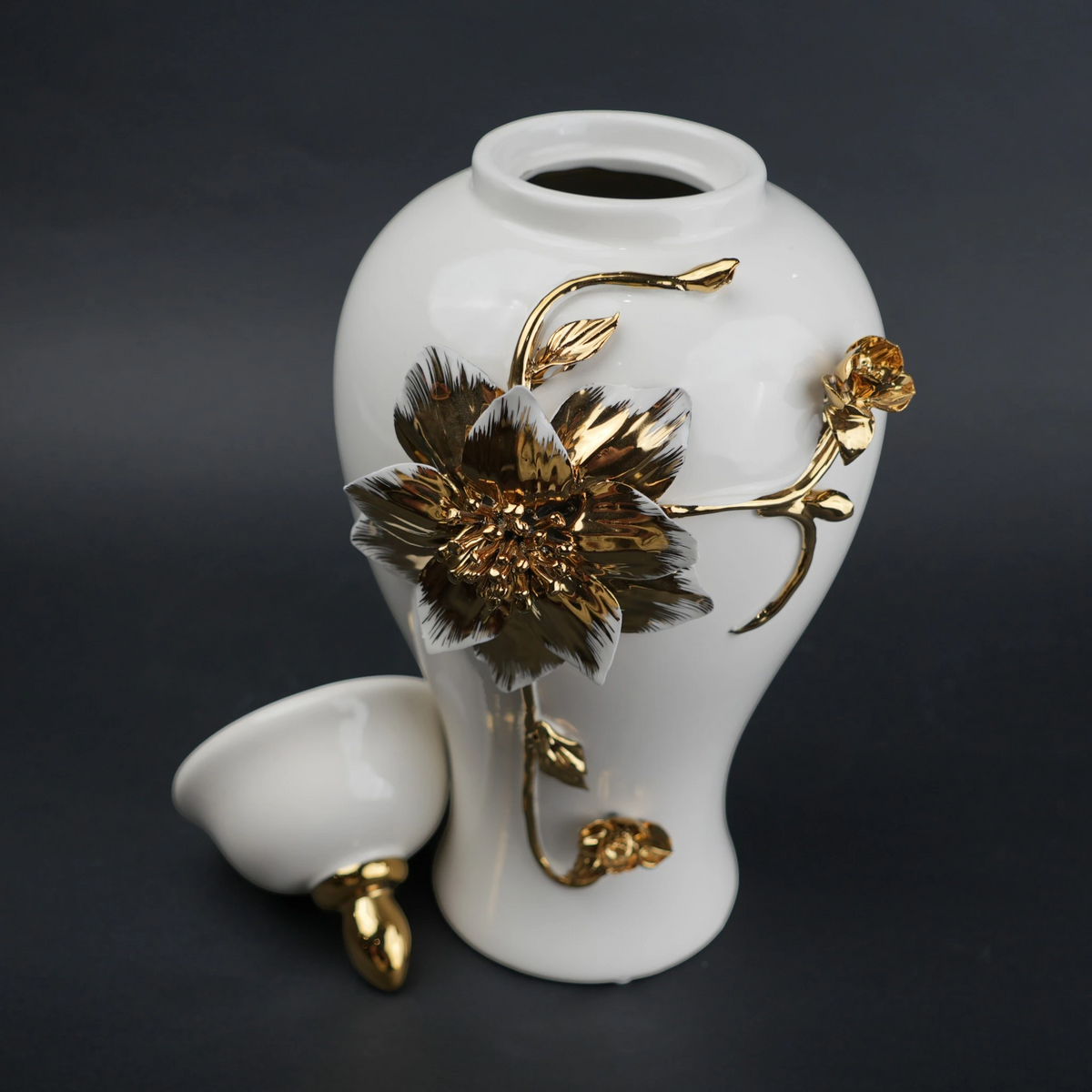 White ceramic jar with gold floral stem design, lid and vase use for home decor styling