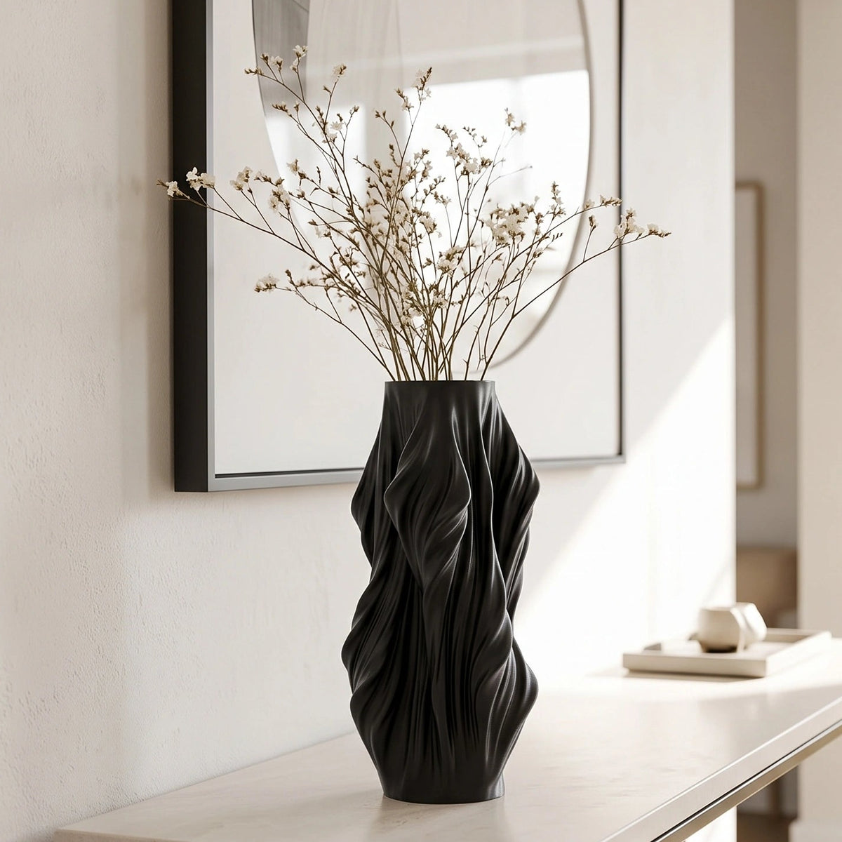 Luxury sculptural resin flower vases featuring flowing artistic textures in matte white and black finishes, ideal for fresh flowers, dried botanicals, console tables and modern designer interiors.`