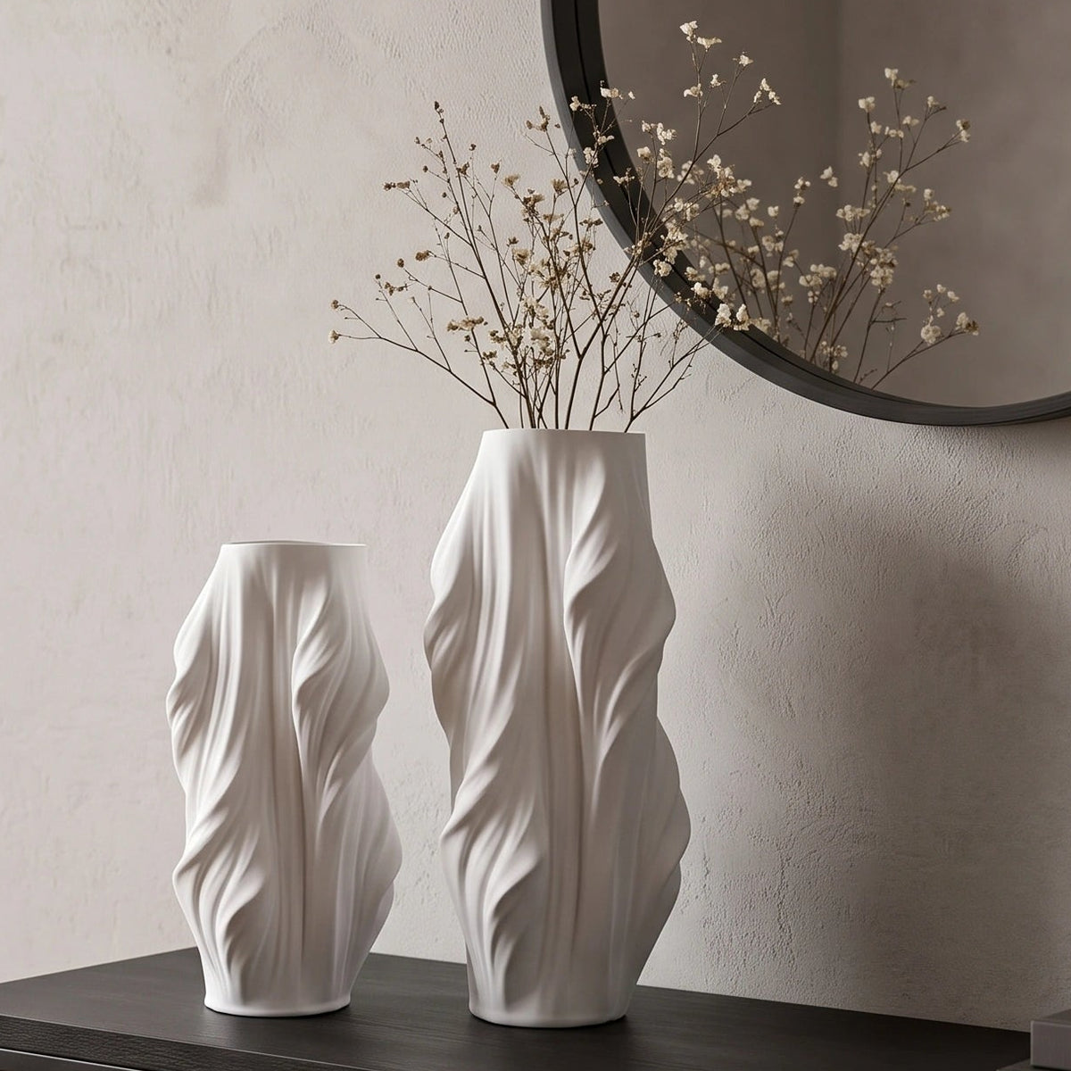 Luxury sculptural resin flower vases featuring flowing artistic textures in matte white and black finishes, ideal for fresh flowers, dried botanicals, console tables and modern designer interiors.`