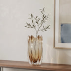 Contemporary art glass vase featuring fluid wave inspired form and handcrafted sculptural detailing for elegant interiors