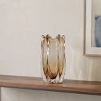 Contemporary art glass vase featuring fluid wave inspired form and handcrafted sculptural detailing for elegant interiors