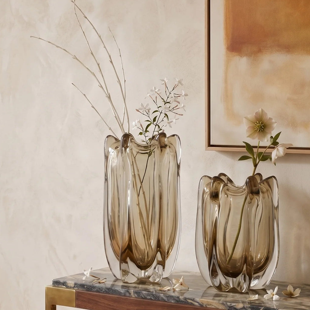 Contemporary art glass vase featuring fluid wave inspired form and handcrafted sculptural detailing for elegant interiors