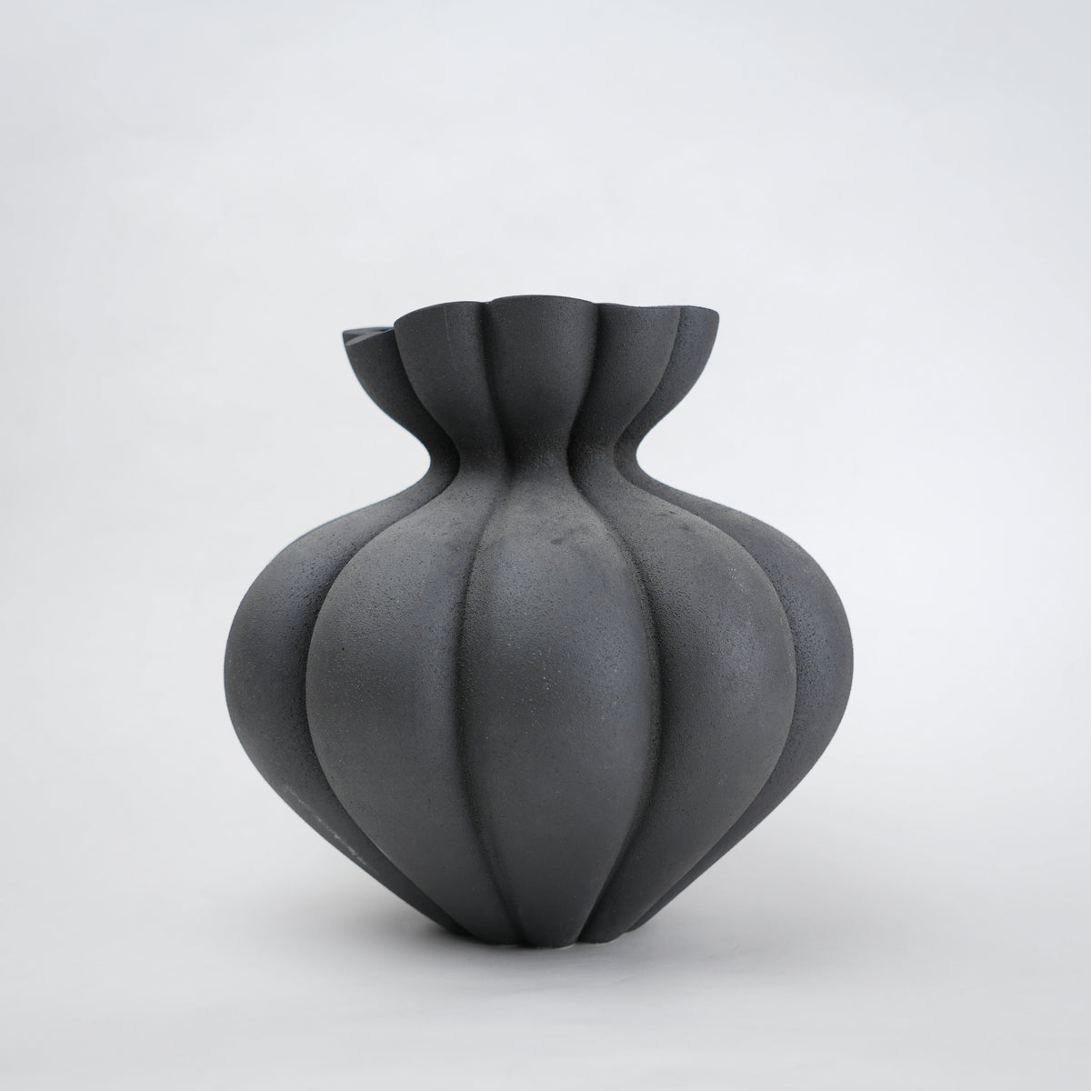 Fluted ceramic vase in matte charcoal for modern home decor styling