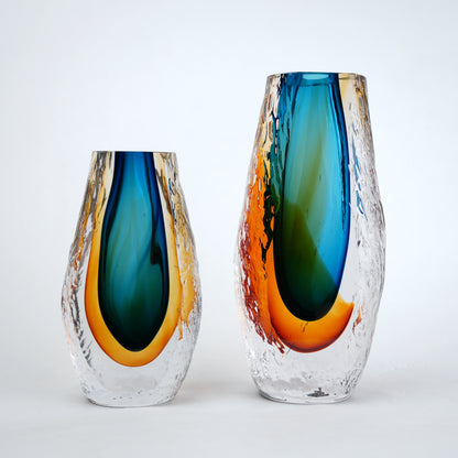 Aqua teal and amber core glass vase with textured clear exterior in two sizes