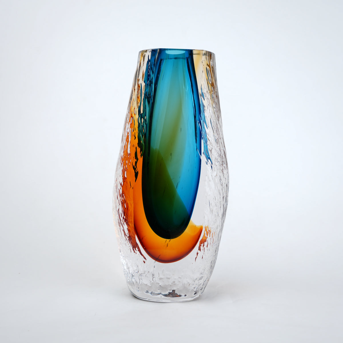 Aqua teal and amber core glass vase with textured clear exterior in two sizes
