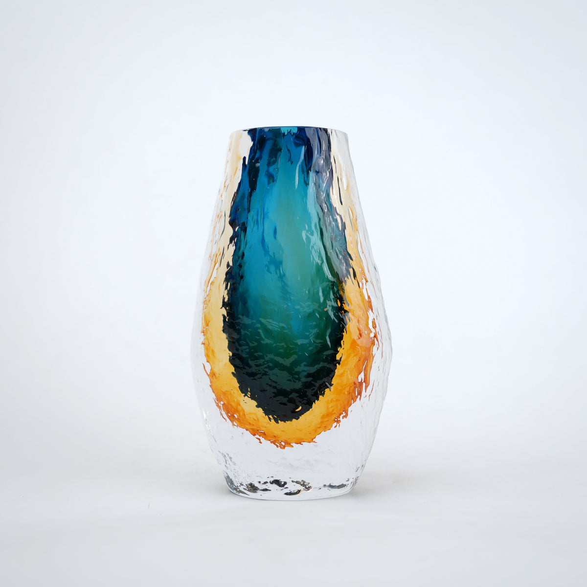 Aqua teal and amber core glass vase with textured clear exterior in two sizes