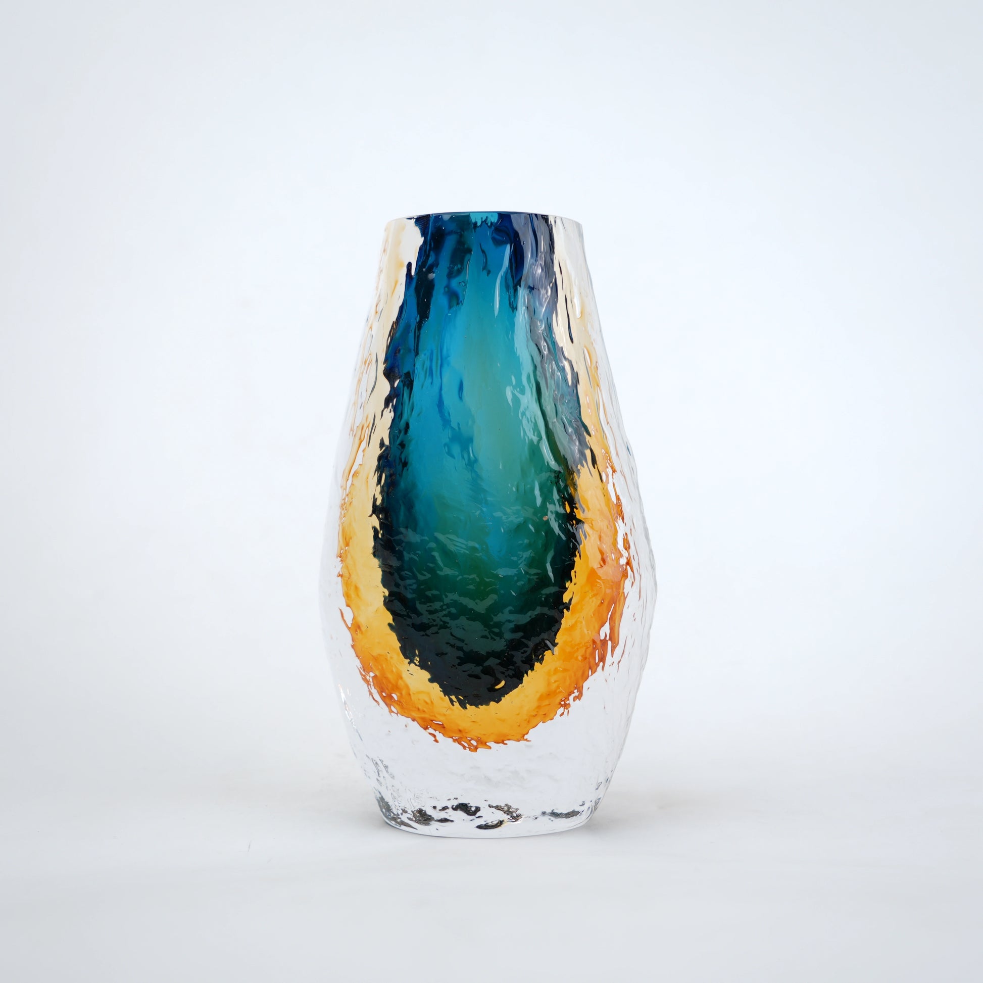 Aqua teal and amber core glass vase with textured clear exterior in two sizes