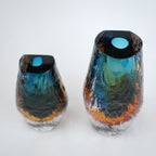 Aqua teal and amber core glass vase with textured clear exterior in two sizes