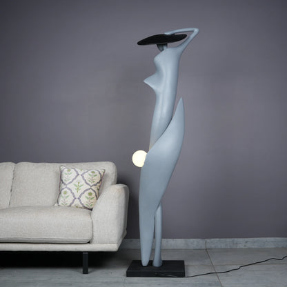 Bluish grey lady sculpture floor lamp with black hat and glowing orb – modern artistic lighting.