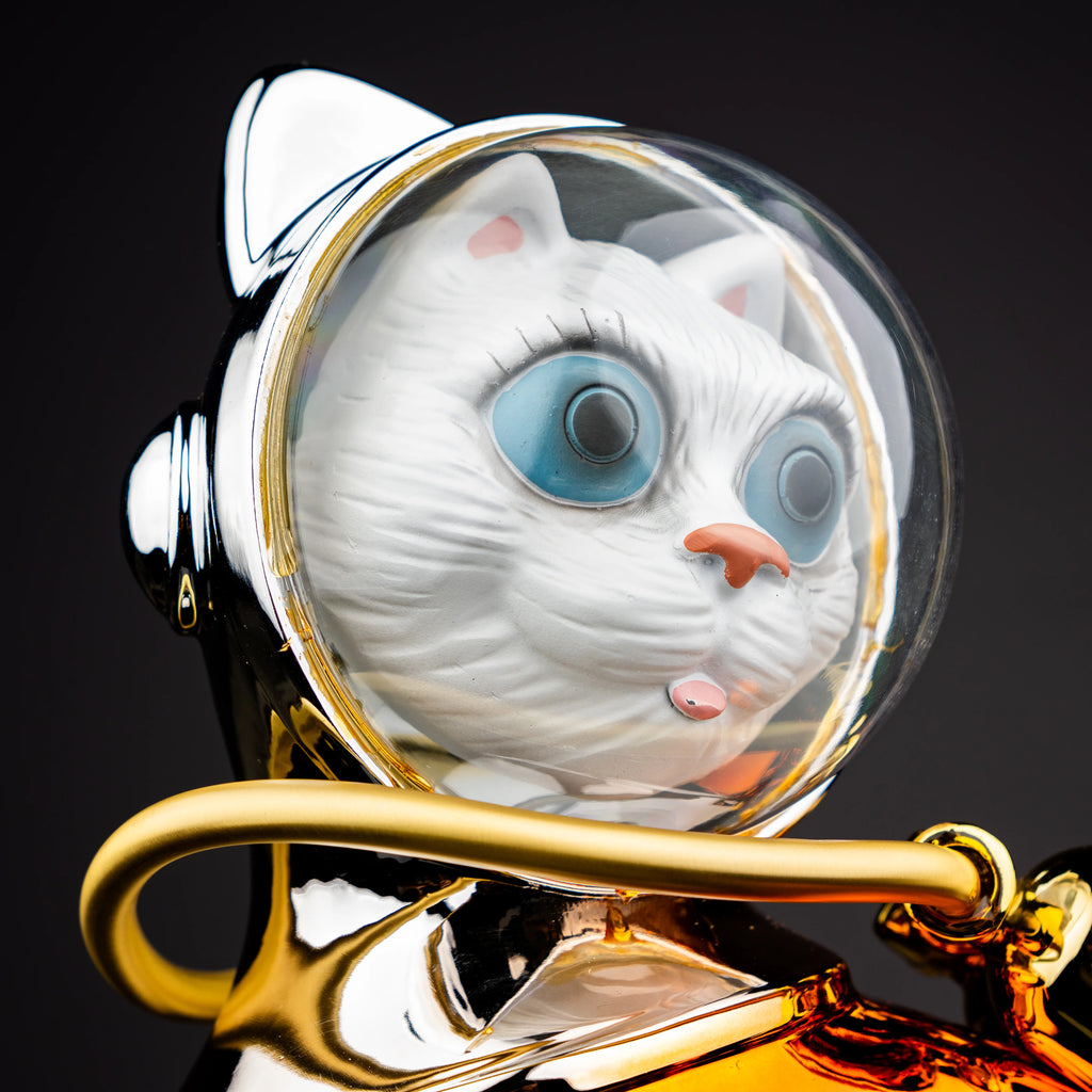 Modern space-themed cat decor accent crafted with glossy metallic finishes and futuristic character styling for luxury interiors