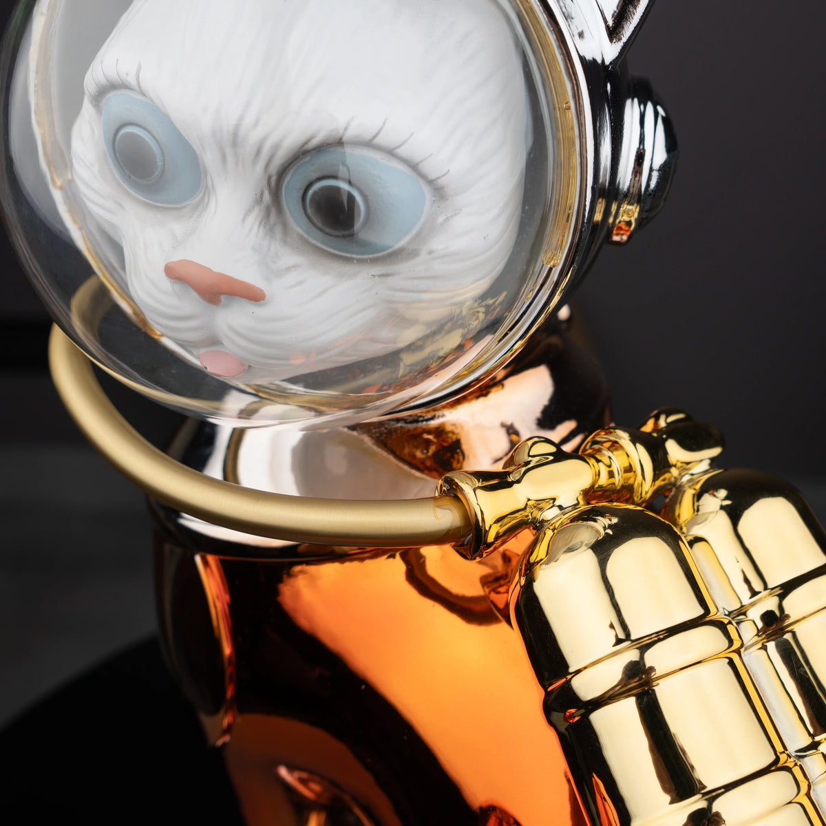 Premium cosmic character figurine with futuristic cat design and metallic decorative finish for contemporary home decor aesthetics