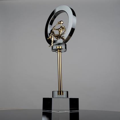 black and gold thinker figurine modern decor