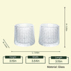Modern whiskey drinkware set with detailed crystal texture and amber drink presentation in a luxury interior