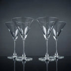 Modern martini glass collection with crystal-clear stemware and olive garnishes for elegant home entertaining arrangements