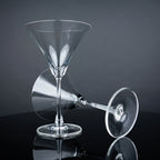 Modern martini glass collection with crystal-clear stemware and olive garnishes for elegant home entertaining arrangements