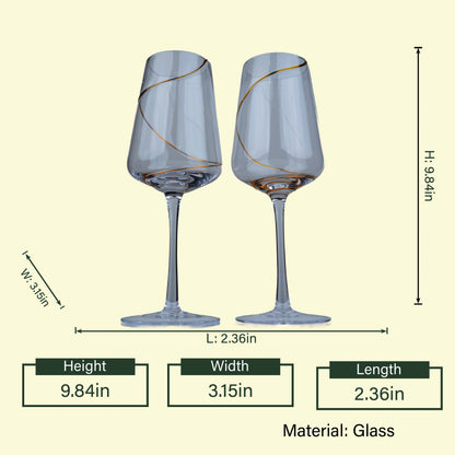 Luxury glassware set featuring modern champagne glasses with decorative gold detailing for home bar decor
